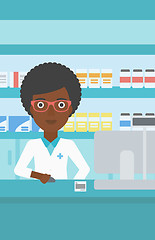 Image showing Pharmacist at counter with computer monitor.