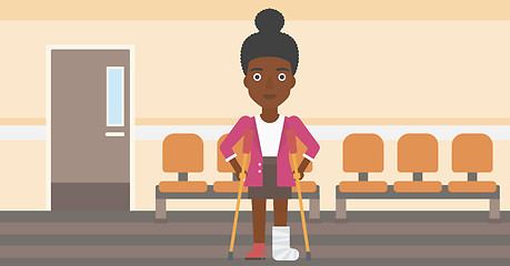 Image showing Woman with broken leg and crutches.