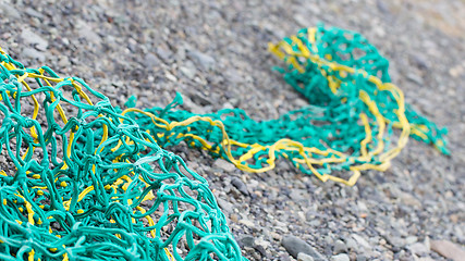 Image showing Fishing nets on a beach