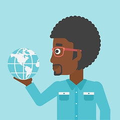 Image showing Businessman holding Earth globe.