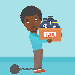 Image showing Chained businessman with bags full of taxes.