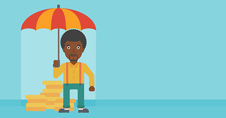 Image showing Businessman with umbrella protecting money.