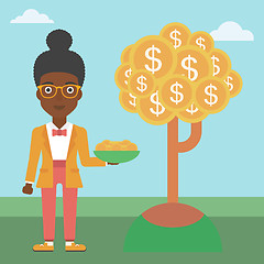 Image showing Business woman catching dollar coins.