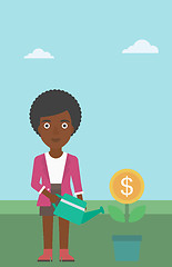 Image showing Business woman watering money flower.