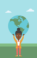 Image showing Business woman holding Earth globe.