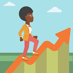 Image showing Business woman running along the growth graph.