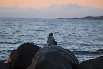 Image showing Child watching Sunset