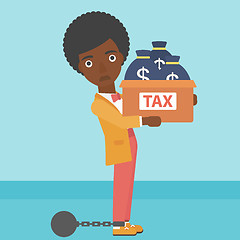 Image showing Chained business woman with bags full of taxes.