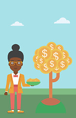 Image showing Business woman catching dollar coins.