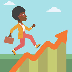 Image showing Business woman running along the growth graph.