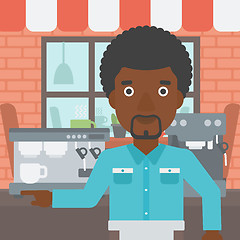 Image showing Barista standing near coffee machine.