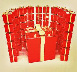 Image showing Bright christmas gifts on a white background . 3D illustration. 