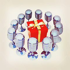 Image showing microphones around gift box. 3D illustration. Vintage style.