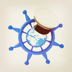 Image showing Steering wheel with Earth, and marine cap . Trip around the worl