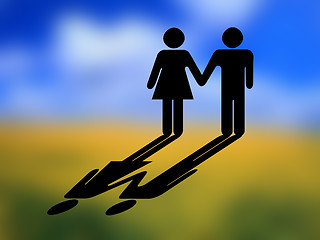 Image showing A couple with shadow on the background of blured landscape