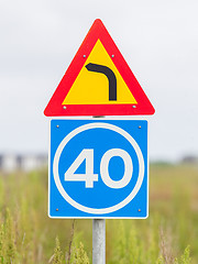 Image showing Curve with advisory speed limit