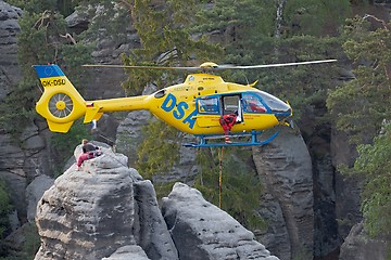 Image showing Rescue helicopter in the mountains