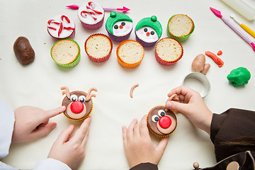 Image showing Closeup of funny christmas cupcakes