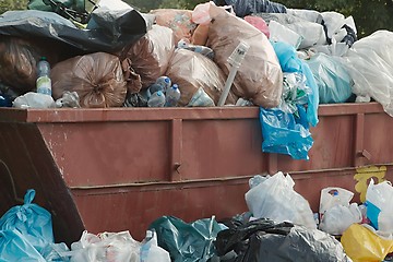 Image showing Garbage Containers Full, Overflowing