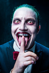 Image showing Bloody Halloween theme: crazy joker face