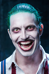 Image showing Bloody Halloween theme: crazy joker face