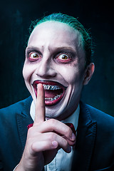 Image showing Bloody Halloween theme: crazy joker face