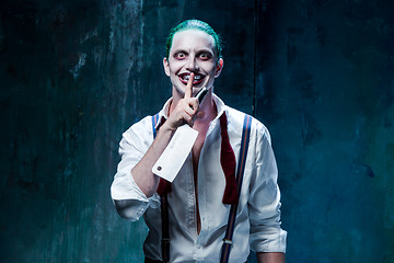 Image showing Bloody Halloween theme: crazy joker face