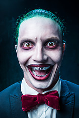 Image showing Bloody Halloween theme: crazy joker face