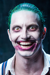 Image showing Bloody Halloween theme: crazy joker face