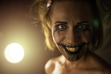 Image showing Horrible girl with scary mouth and eyes