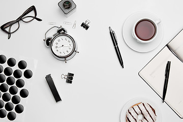 Image showing The clock, pen, and glasses on white background