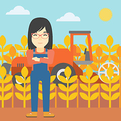 Image showing Woman standing with combine on background.