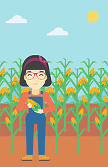 Image showing Female farmer holding corn vector illustration.