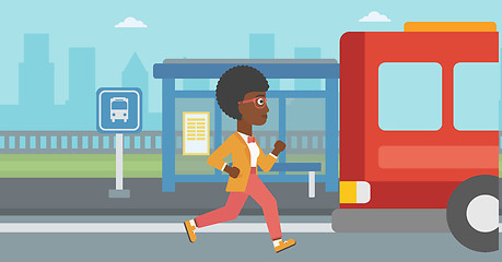 Image showing Latecomer woman running for the bus.