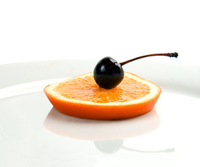 Image showing orange&cherry on a plate