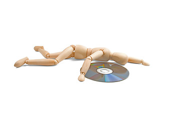 Image showing wood mannequin with CD-rom