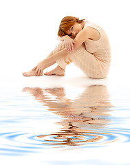 Image showing relaxed lady on white sand