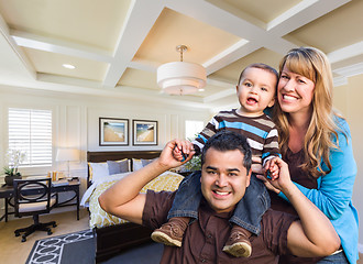 Image showing Mixed Race Family In New Custom Bedroom