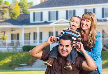 Image showing Happy Mixed Race Young Family in Front of House