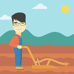 Image showing Farmer on the field with plough.