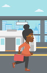 Image showing Woman at the train station vector illustration.