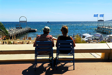 Image showing Couple relaxing in chairs in Cannes