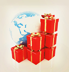 Image showing Traditional Christmas gifts and earth on a white background. Glo