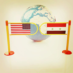Image showing Three-dimensional image of the turnstile and flags of USA and Sy