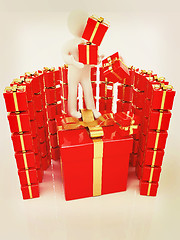 Image showing ?? ????? ???? 3d man and red gifts with gold ribbon. 