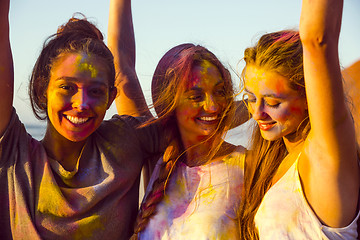 Image showing Playing with colored powder