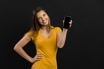 Image showing Beautiful girl with a smartphone