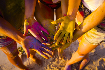 Image showing Playing with colored powder