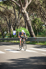 Image showing Grosseto, Italy - May 09, 2014: The disabled cyclist with the bike during the sporting event