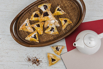 Image showing Tea, buns with jam